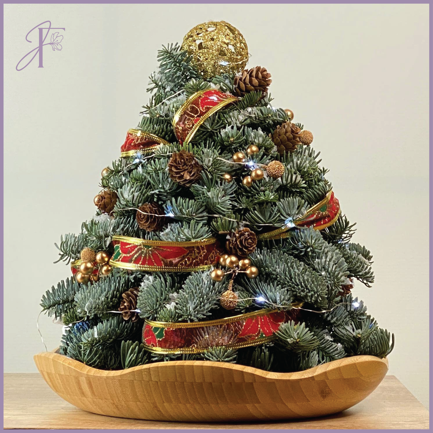 Miniature Christmas Tree Centerpiece – flowers, delivered in Bahrain