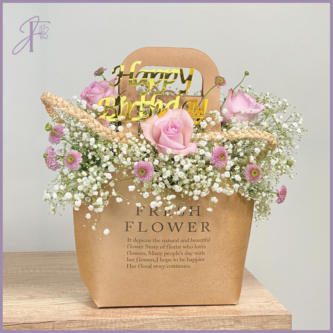 Whispers of Joy - Birthday Floral Bag – flowers, delivered in Bahrain