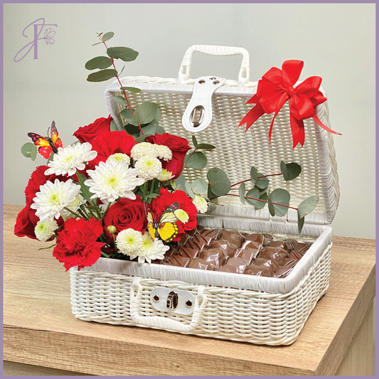 Dolcetta’s Basket of Treats by Jude Flowers