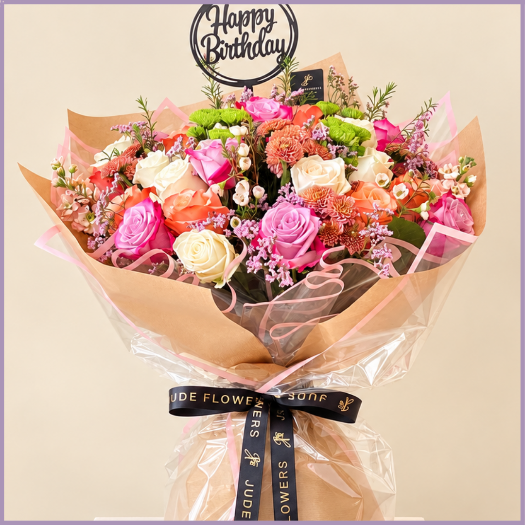 Birthday Garden bouquet of purple, white and orange roses with birthday topper – Jude Flowers Bahrain