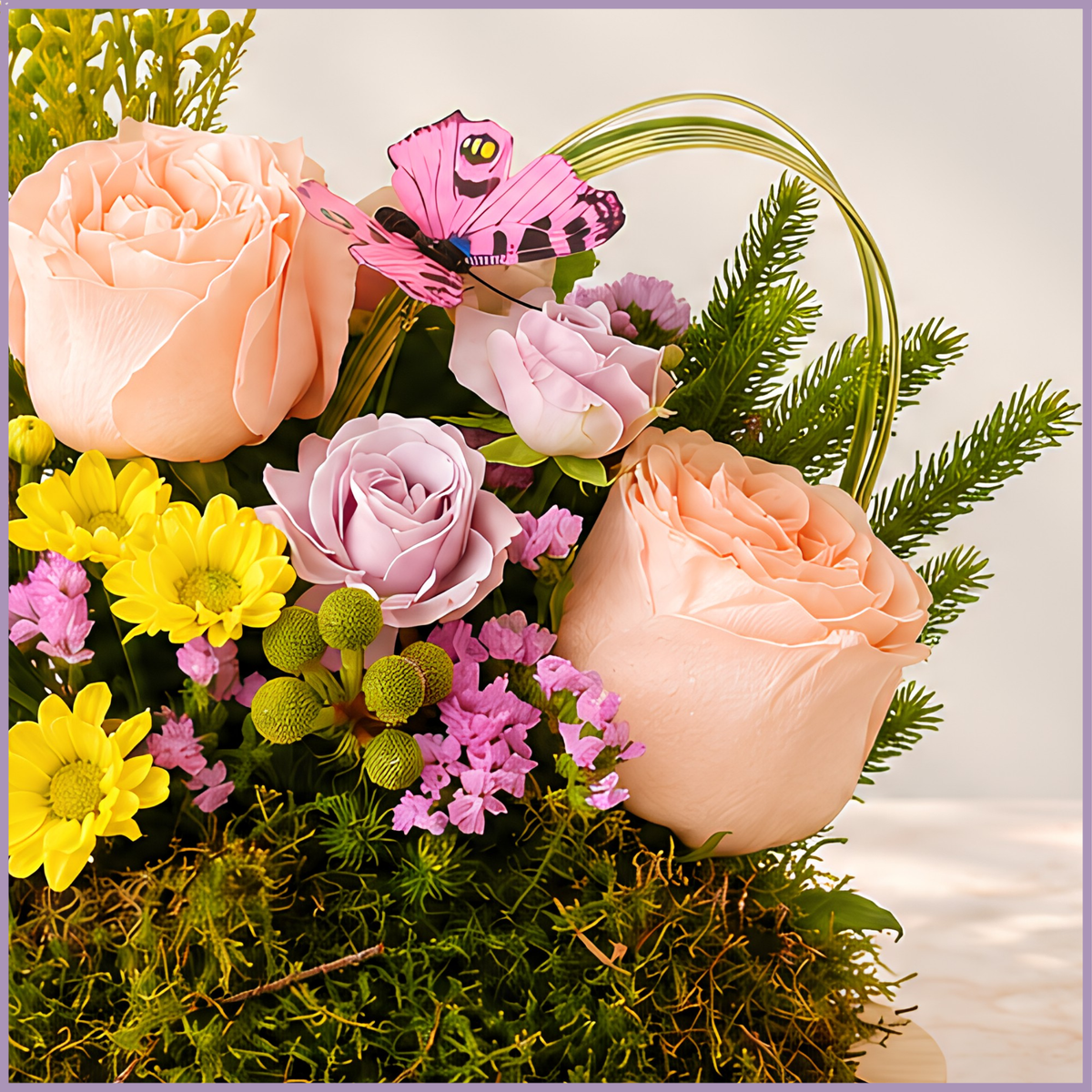 Petite Bliss pink rose and santini floral arrangement on a moss base with decorative butterfly – Jude Flowers Bahrain