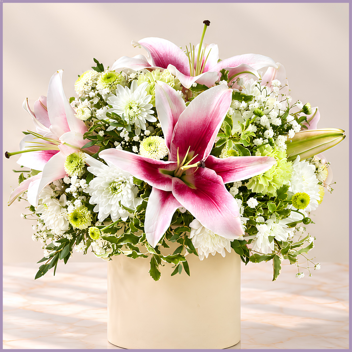 Pink Reverie floral arrangement with lilies, chrysanthemums and carnations in Bahraini pottery vase – Jude Flowers Bahrain