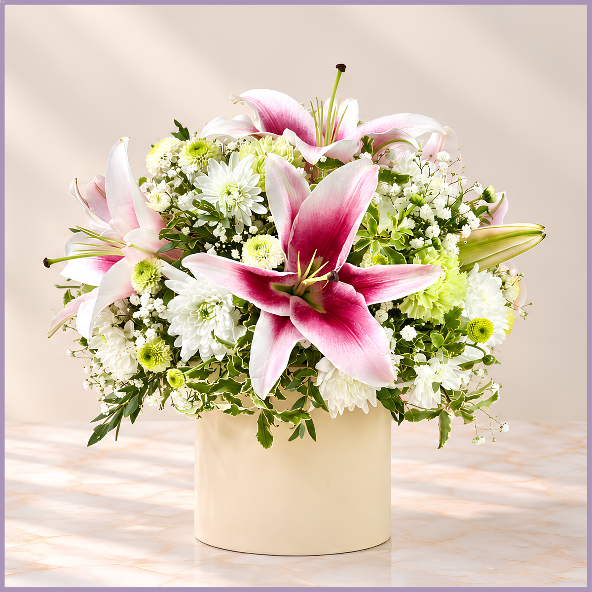 Pink Reverie floral arrangement with lilies, chrysanthemums and carnations in Bahraini pottery vase – Jude Flowers Bahrain
