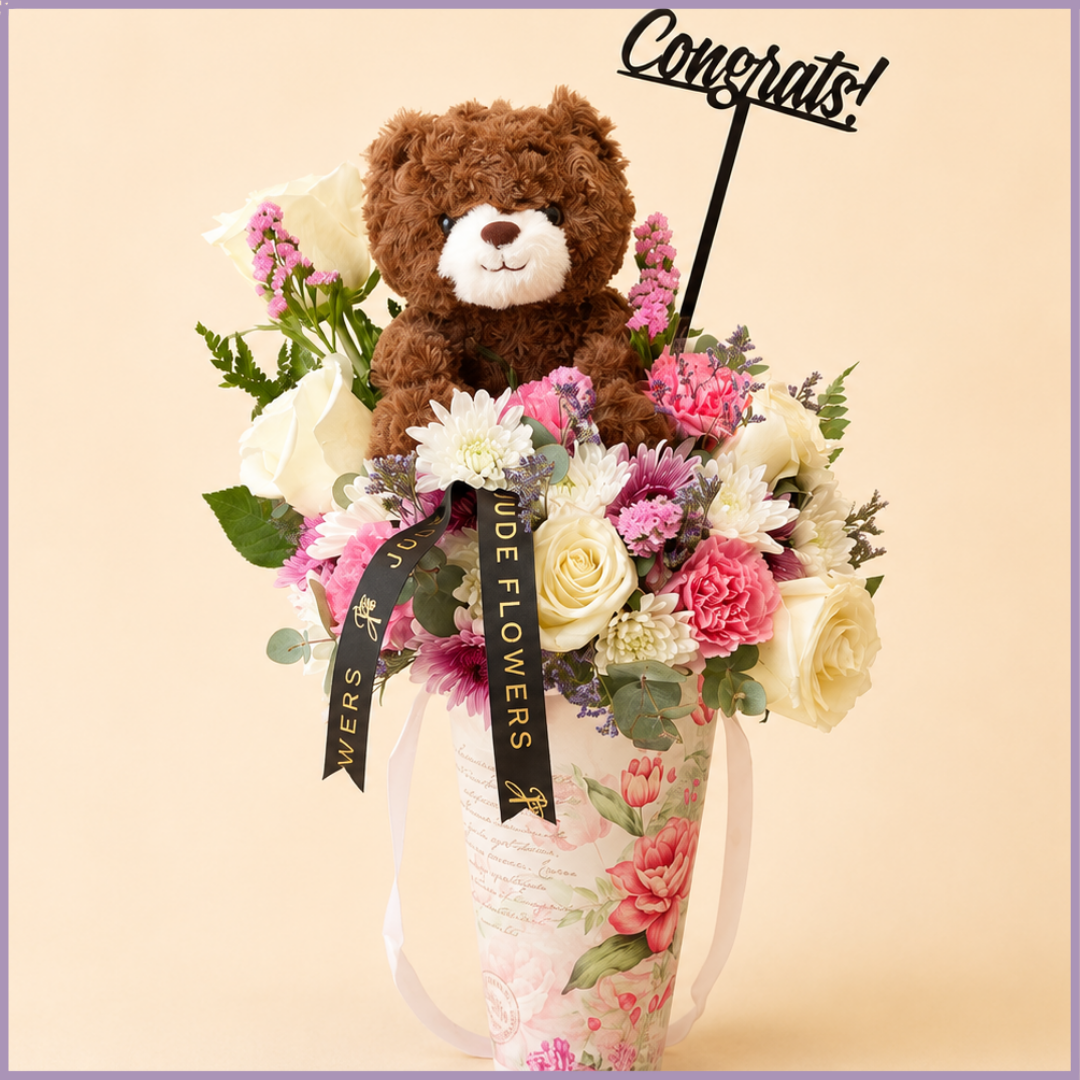 Rosy Congratulations – Flowers & Teddy Bear Gift Arrangement