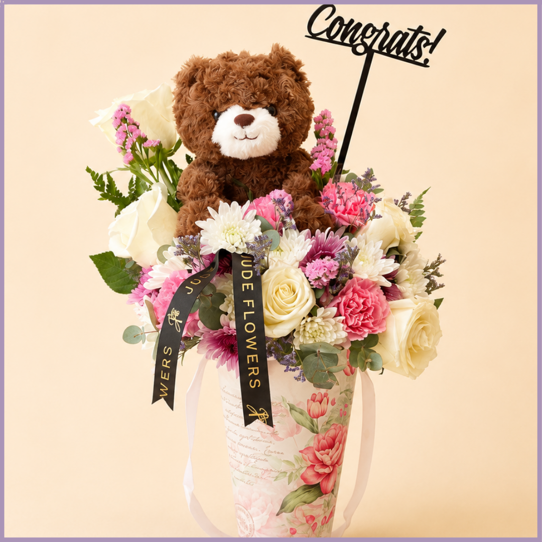 Rosy Congratulations – Flowers & Teddy Bear Gift Arrangement