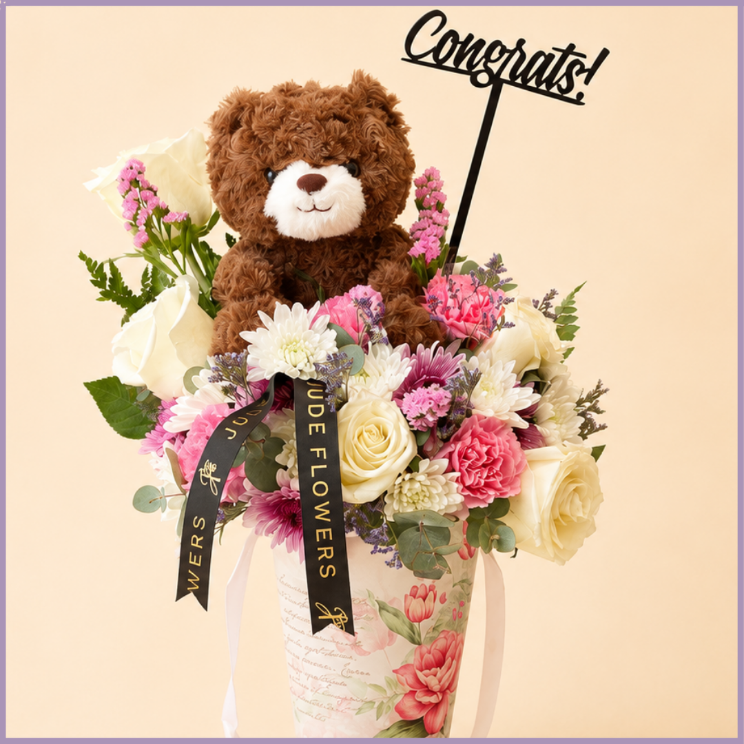 Rosy Congratulations – Flowers & Teddy Bear Gift Arrangement